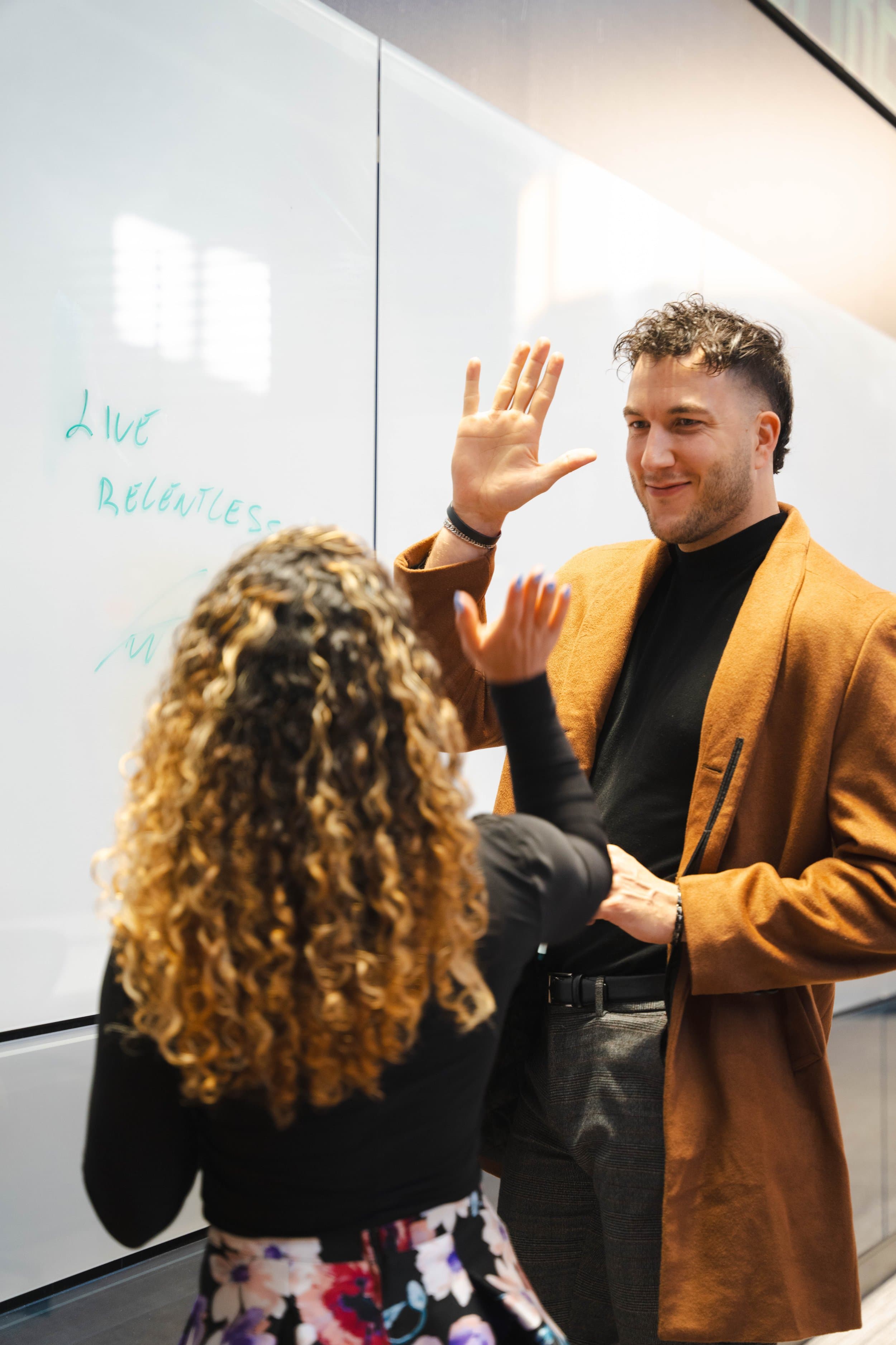 Two collaborators working on brand strategy